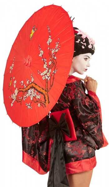 Roter Schirm mit asiatischem Muster