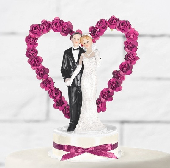 Tortenfigur Hochzeitspaar mit pinkem Herz