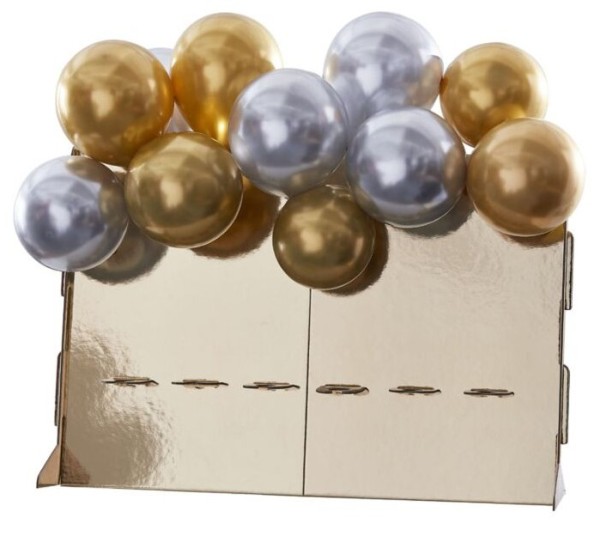 Goldene Sektwand mit Ballons